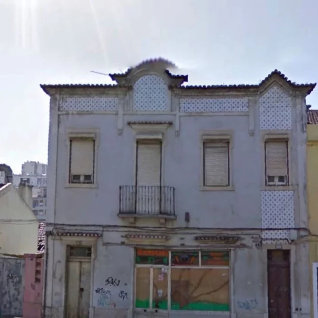 Before — the facade before the works