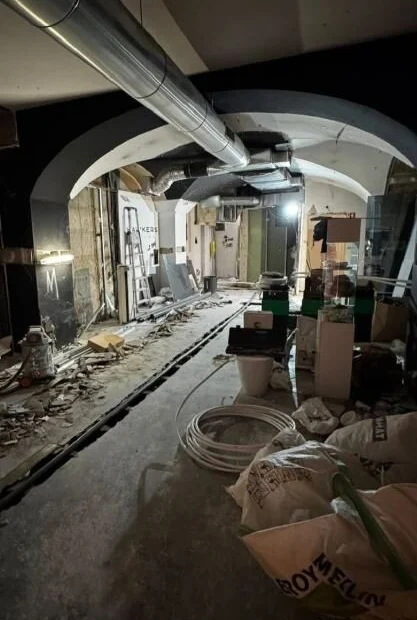 Before — commercial space under construction, services exposed