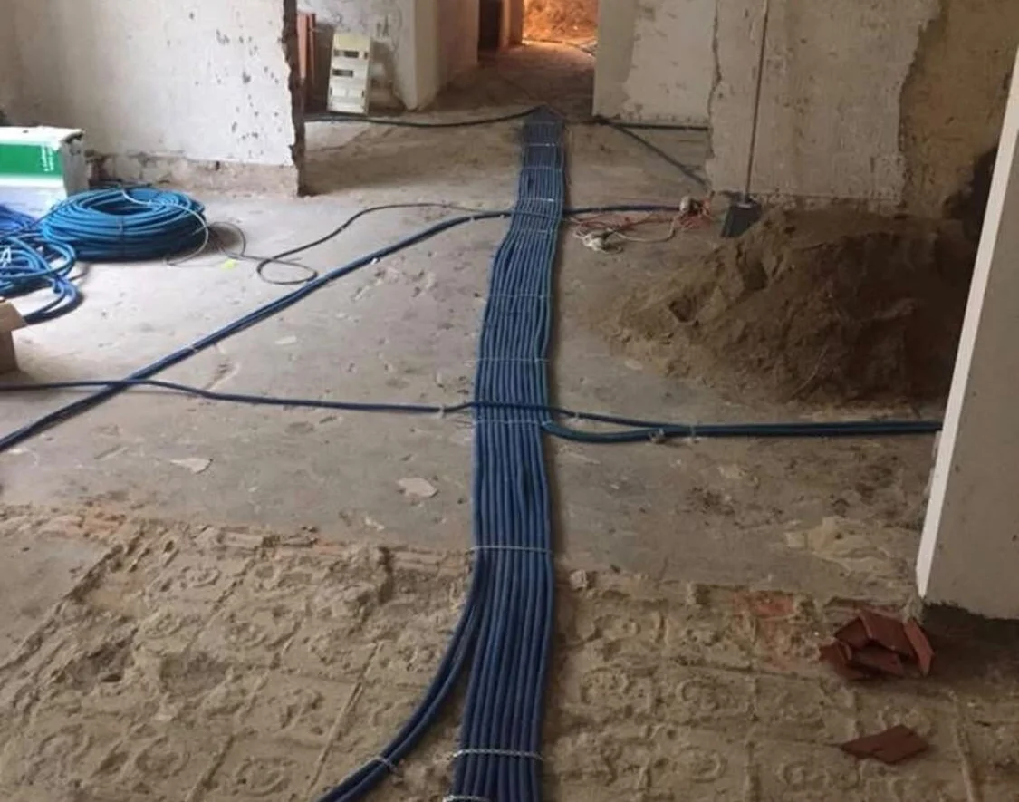 Conduit set into the floor