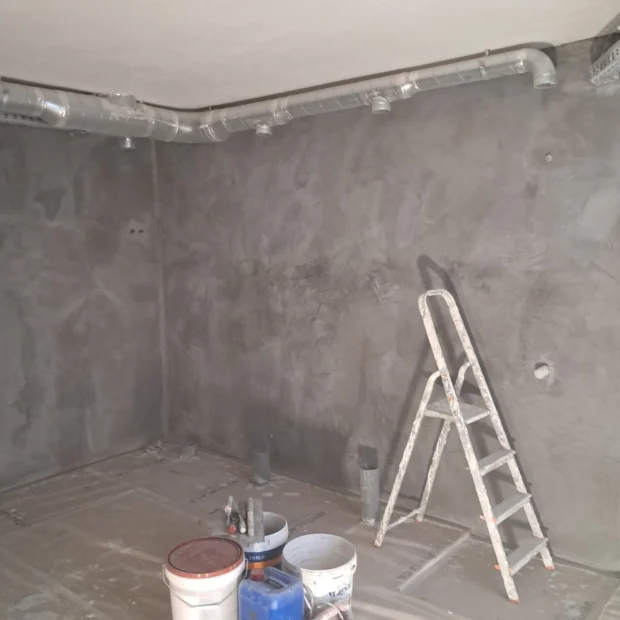 Applying microcement to walls