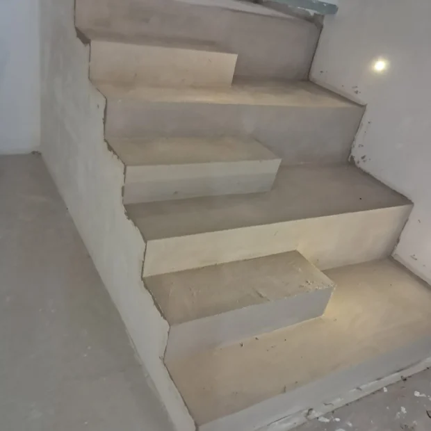Stair finished in microcement, base coat