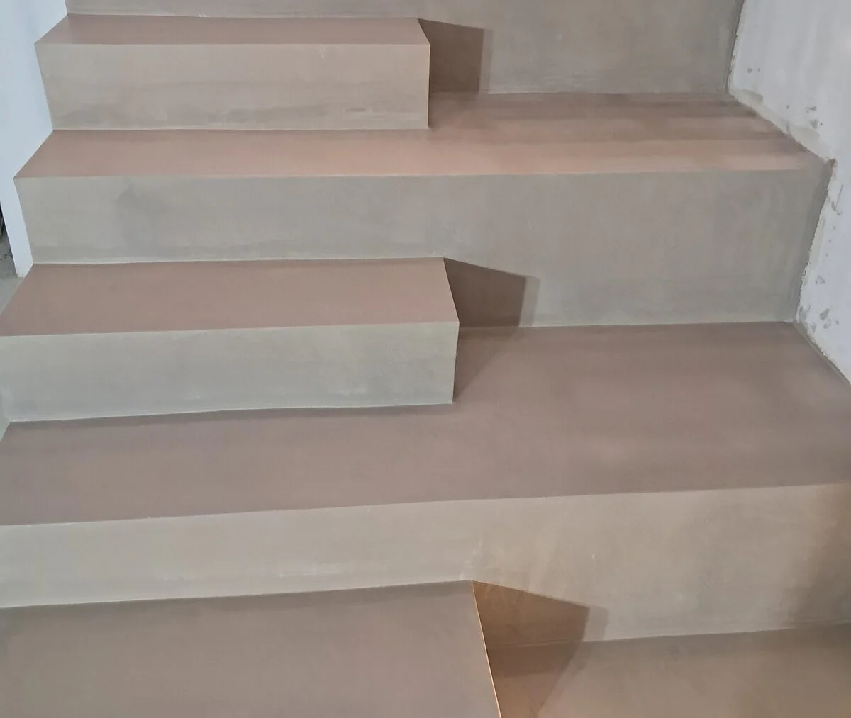 Pale microcement stairs finished