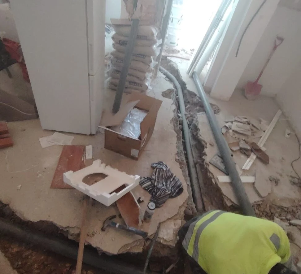 Water and waste runs opened up in the floor